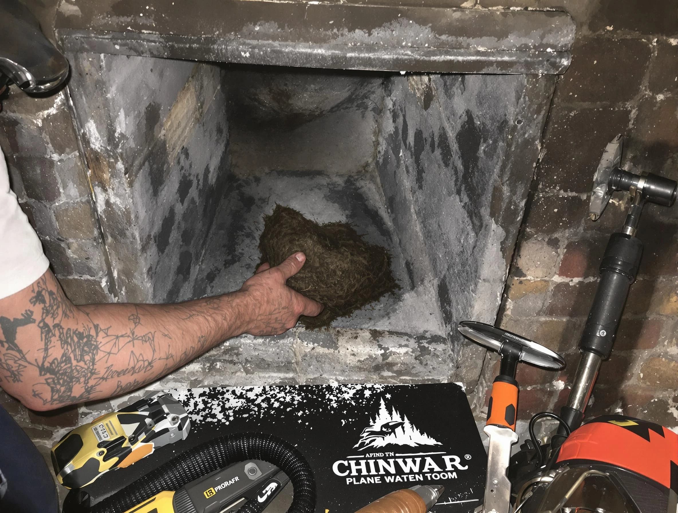 McKeesport Chimney Sweep safely removing debris and screening chimney in McKeesport, PA